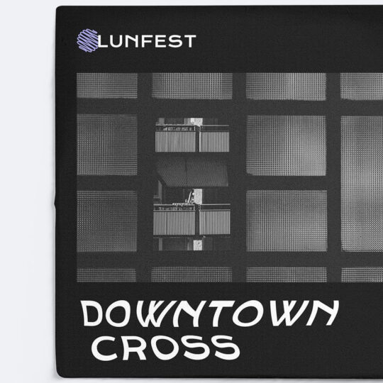 A black and white photo of the front cover of downtown cross.