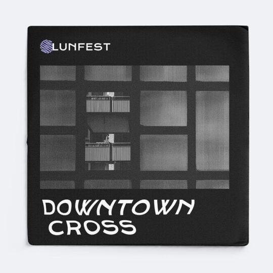 A black and white photo of the cover of downtown cross.